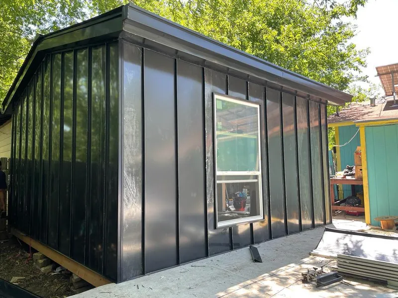 Black standing seam metal wall panels for Roof Inspection in Sunrise Manor